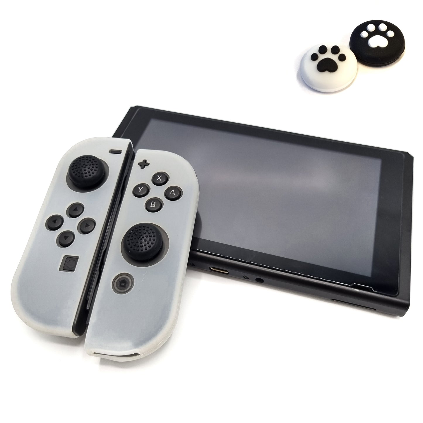 Schutzhüllen + Daumengriffe | Performance Anti-Rutsch-Haut | Softcover-Griffhülle | Weiß + Beine Schwarz/Weiß | Zubehör passend für Nintendo Switch Joy-Con Controller